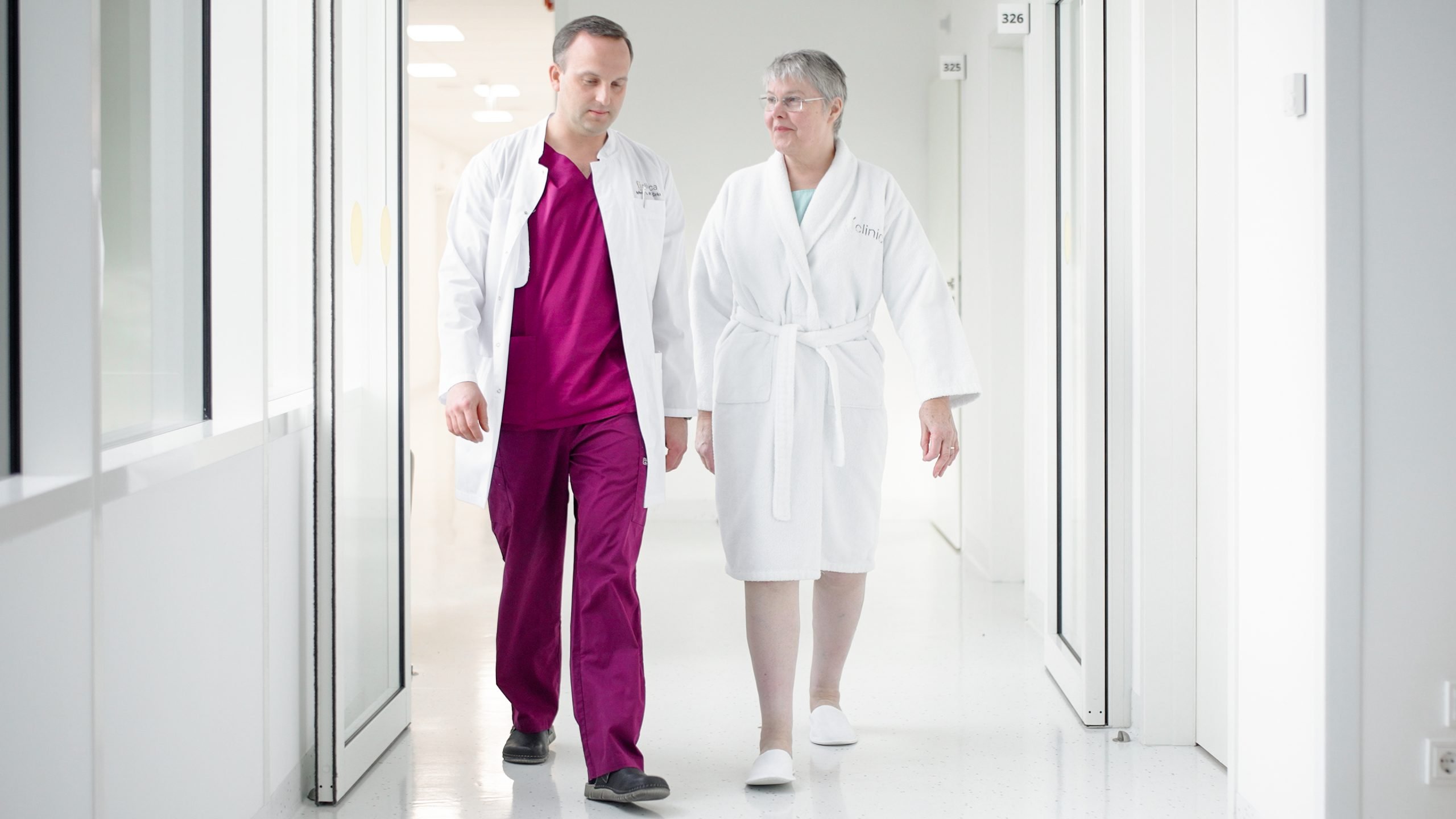 Aurimas Širka with Marina Stock Physician Aurimas Širka with a patient Marina Stock